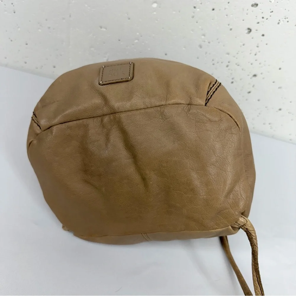 The SAK Taupe Leather Drawstring Backpack